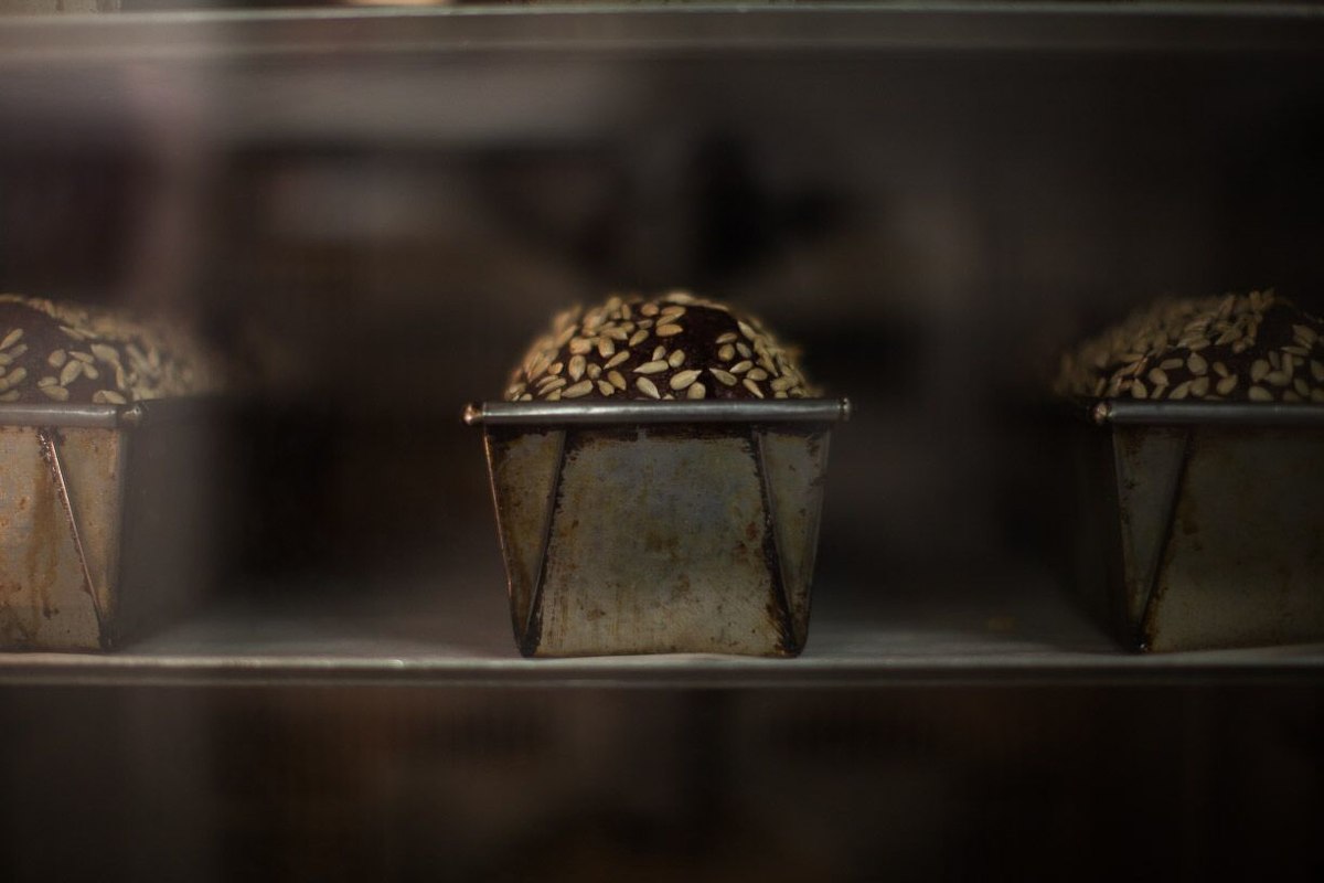 Rye bread being baked in our bakery at 24 Rose street
